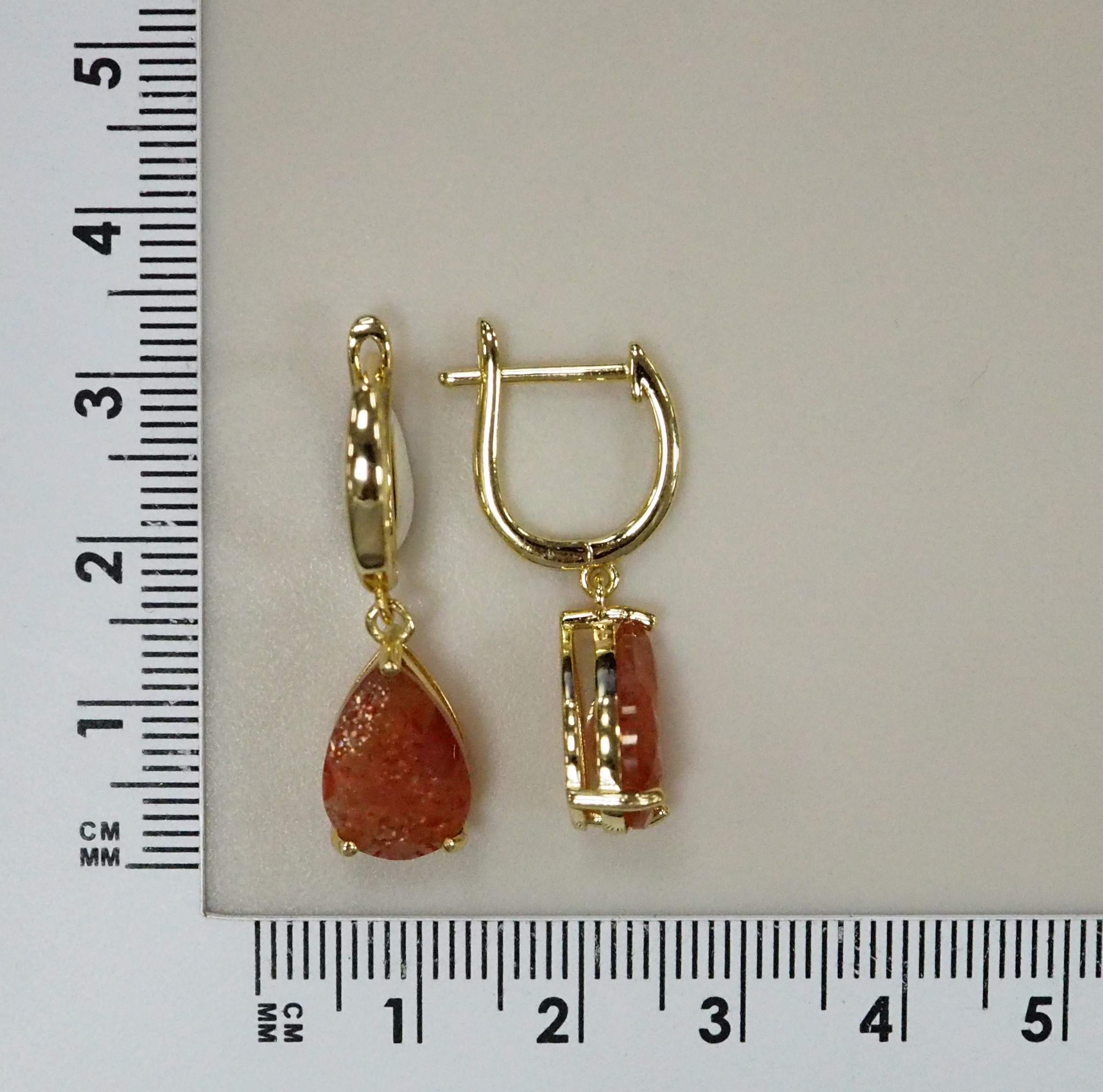 Серебряные серьги с солнечными камнями